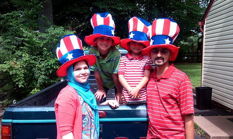 Atif, pictured with his family outside their home on the fourth of July, canvasses the state of Virginia in a bid to combat the vitriol directed towards American Muslims in the US election 2016. — Photo by writer