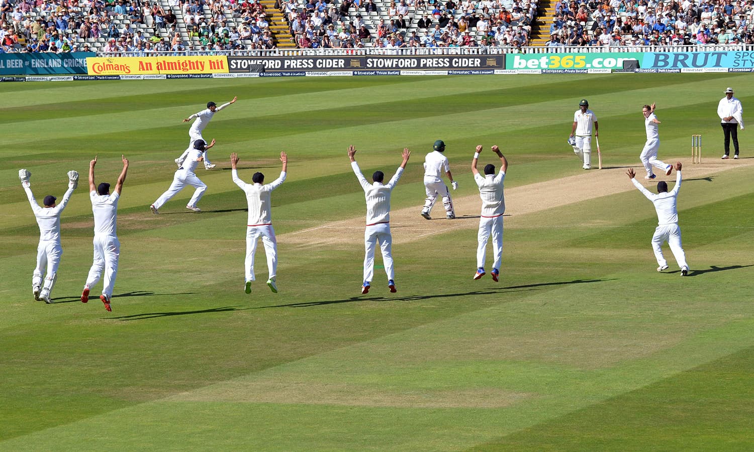 England's slip fielders all go up as they appeal for lbw against Pakistan's Yasir Shah. — AFP