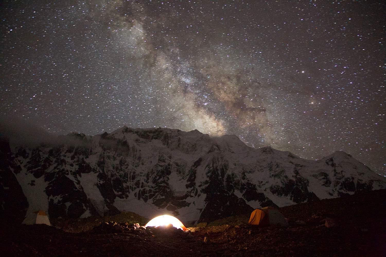 Goro II is notorious for being the coldest site. I took this photograph of the Milky Way extending from Biarchedi mountain with my tent lit up.