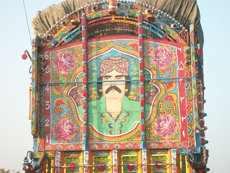 Portrait of a famous Sindhi poet and folk singer on a truck in Sindh.