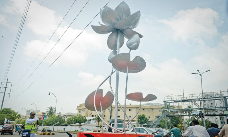 Only metal flowers grow in concrete jungles.