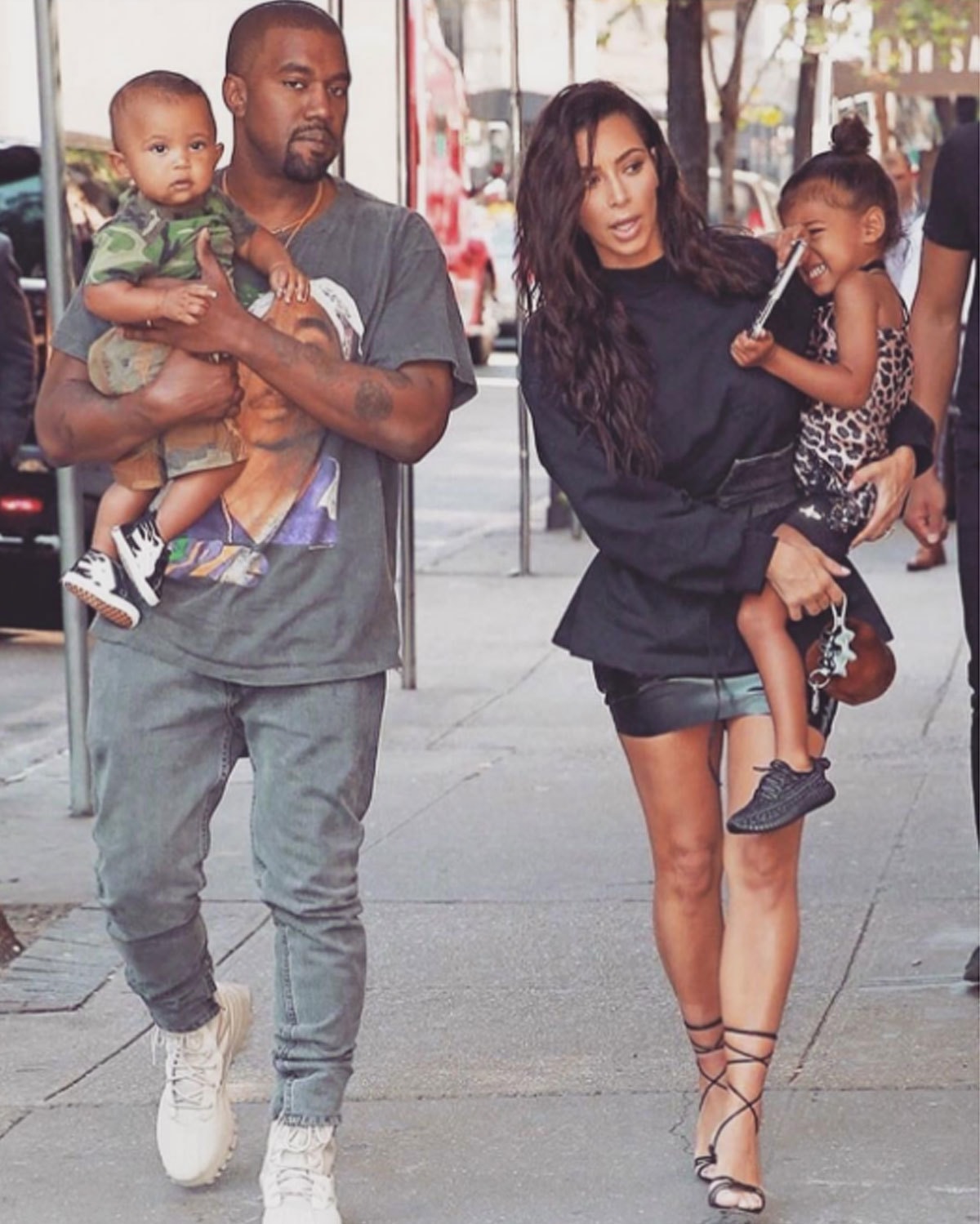 Kanye and Kim head out with their kids North and Saint. -Instagram