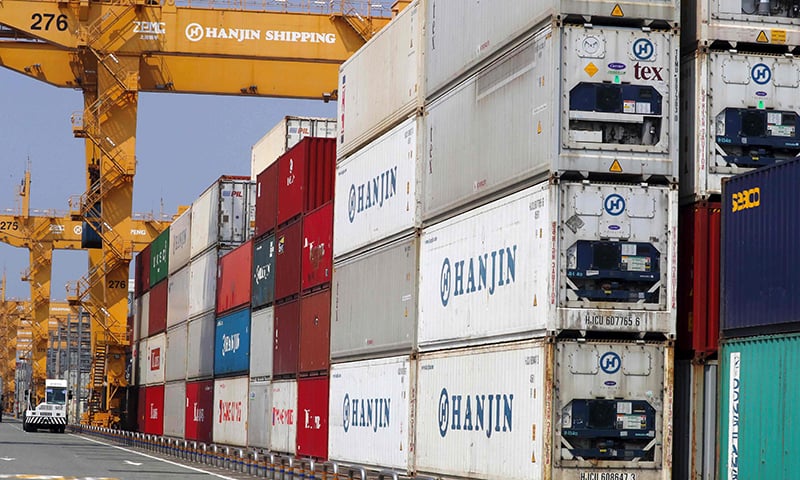 Containers are stacked up at a cargo terminal of Hanjin Shipping in the southeastern port city of Busan, South Korea ─ AP
