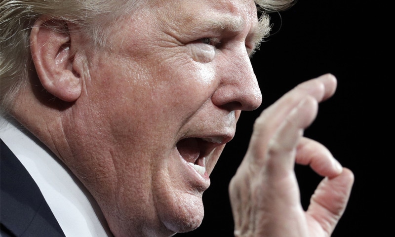 MICHIGAN: Republican presidential candidate Donald Trump speaks at a rally on Friday.&mdash;AP