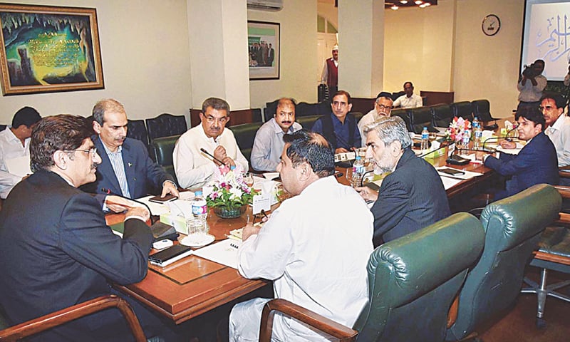 Sindh Chief Minister Murad Ali Shah presides over a meeting on katchi abadis at CM House on Thursday.&mdash;APP