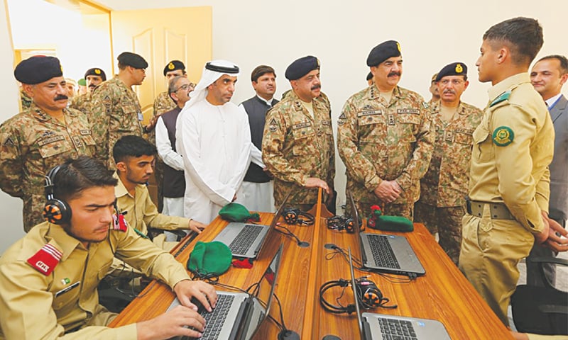 CHIEF of the Army Staff Gen Raheel Sharif talking to a student during his visit to the Cadet College, Spinkai, in South Waziristan on Thursday.&mdash;Dawn