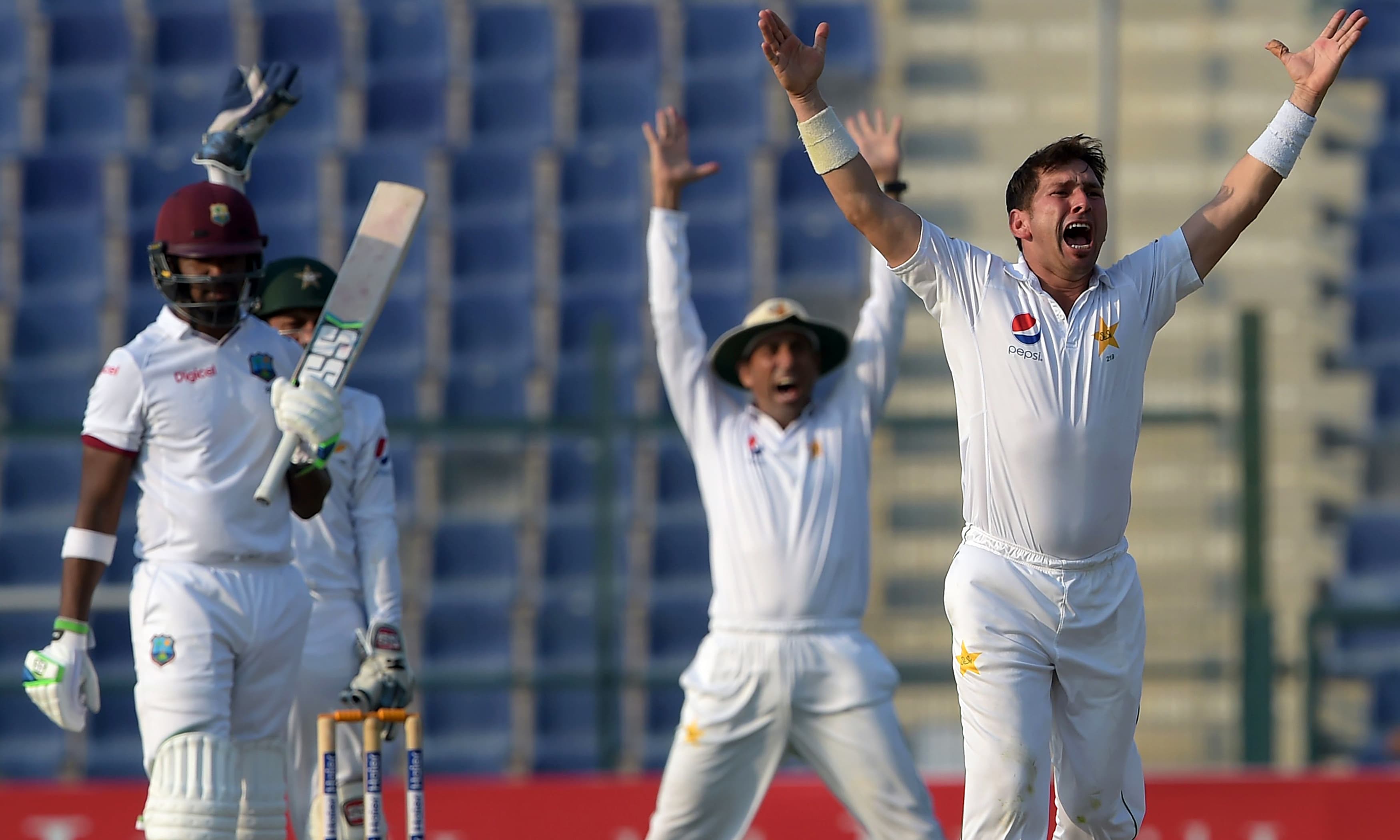 Yasir Shah makes a successful leg before wicket appeal against the Darren Bravo. &mdash;AFP