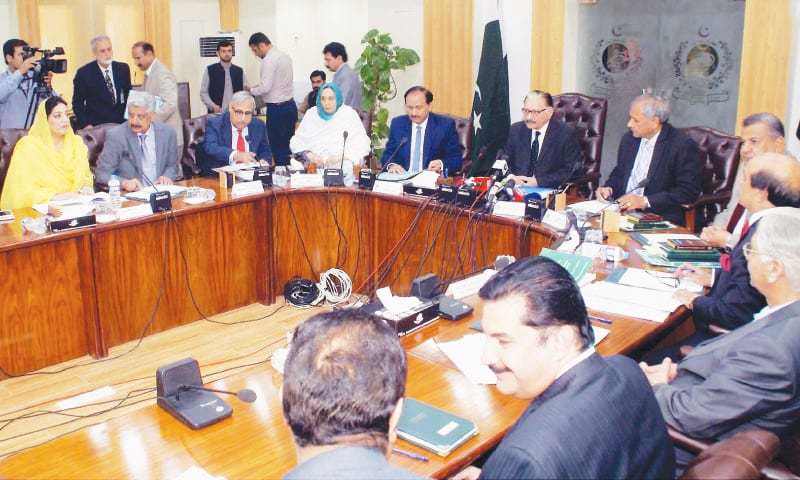 ISLAMABAD: Chief Election Commissioner retired Justice Sardar Mohammad Raza Khan chairing a consultative meeting with leaders of different political parties on Wednesday.&mdash; INP