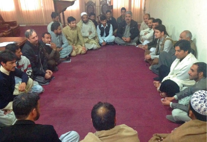 Poets and writers gather for a weekly literary session at Pashto Academy Hall, University of Peshawar. &mdash; Dawn