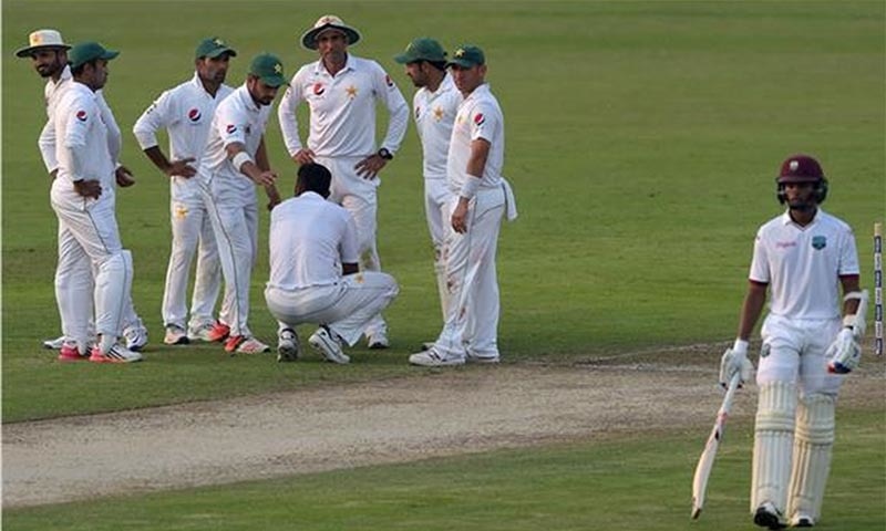 Pakistani players celebrate after the dismissal of West Indies' batsman Shane Dowrich. ─AFP Pakistani players celebrate after the dismissal of West Indies' batsman Shane Dowrich. ─AFP