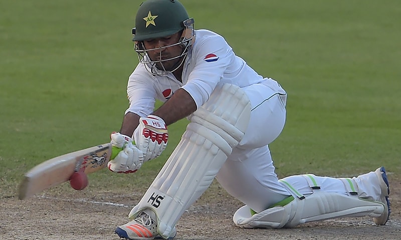 Sarfraz Ahmed plays a shot on the third day of the third and final Test. ─AFP