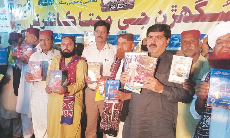 PROCEEDINGS of the conference on folk literature recognition under way in Lalu Ronk town of Larkana district.&mdash;Dawn