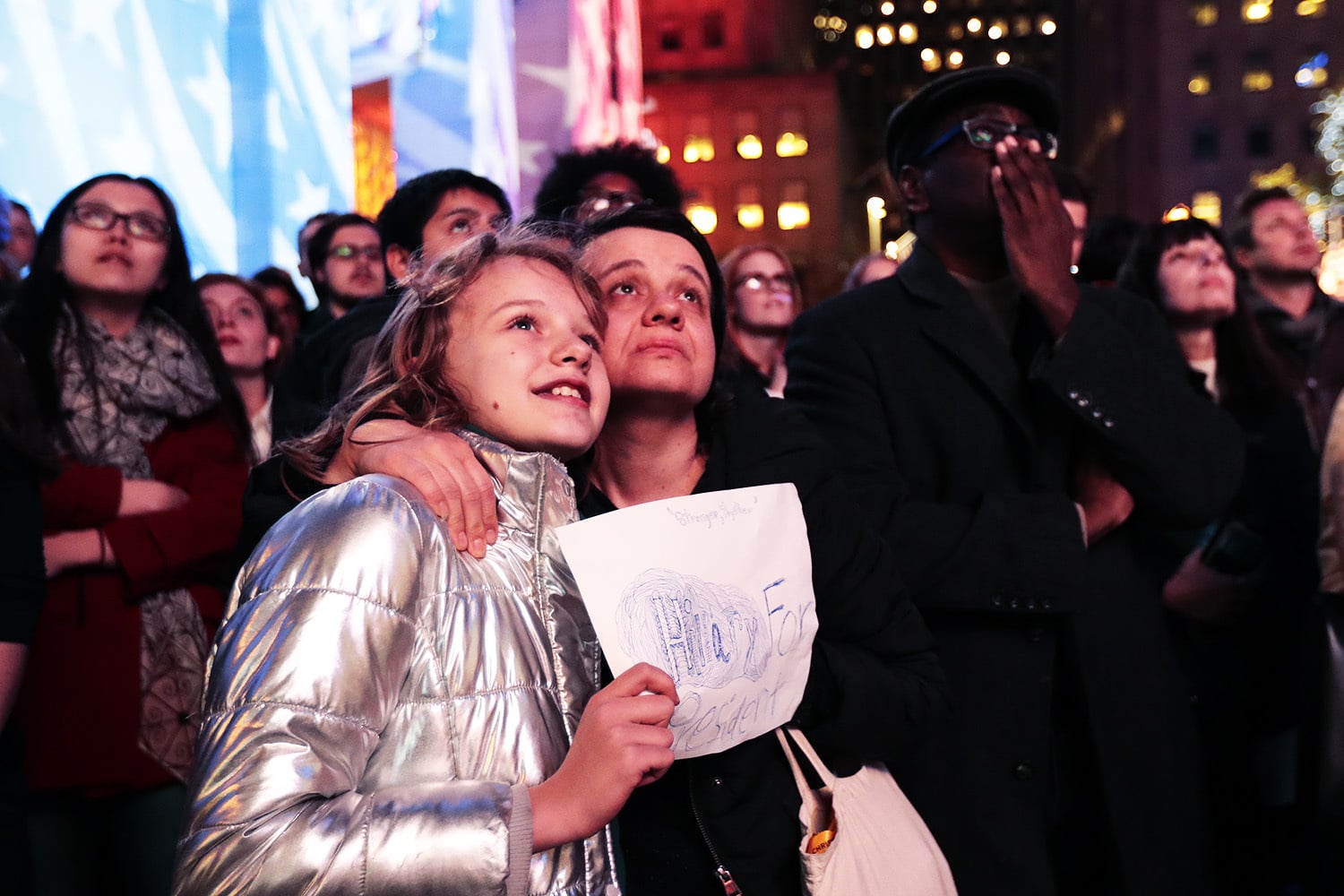 People watch Election Day results on a large screen during a gathering at Rockefeller Center, in New York.—AP