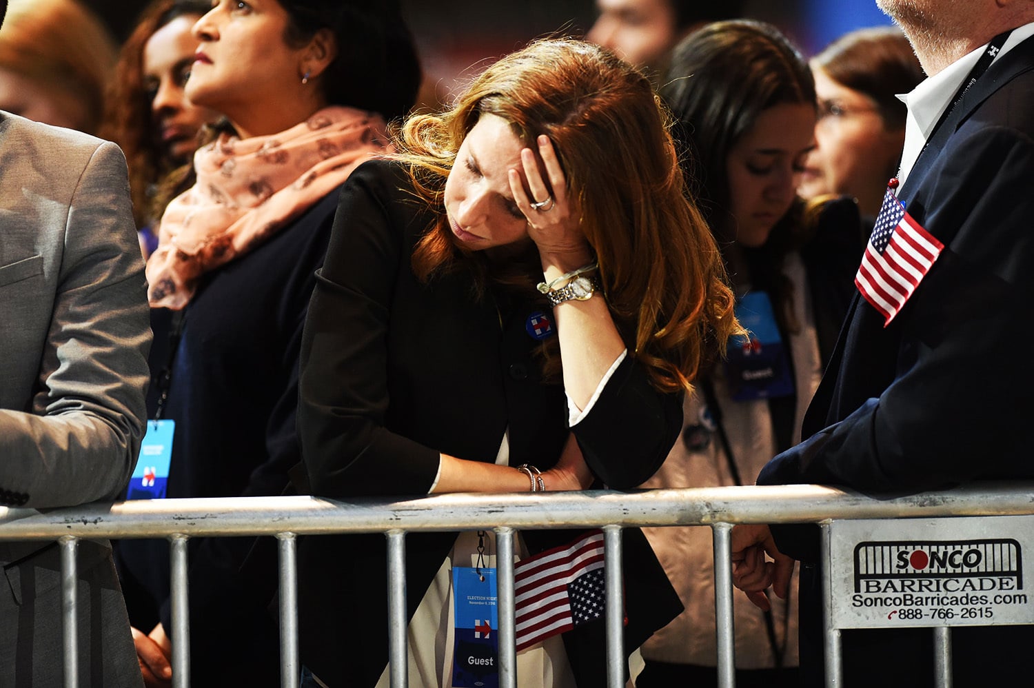 A supporter of Hillary Clinton reacts as elections returns are reported during election night.—AFP