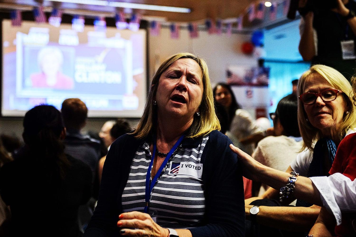 Supporters of Hillary Clinton react as they watch live coverage of the US elections.—AFP