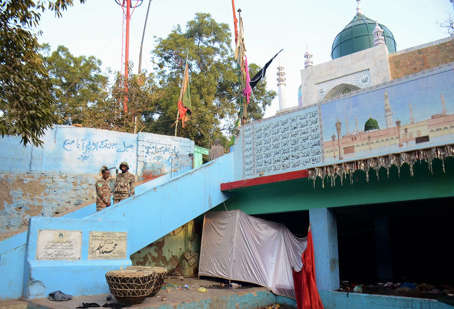 Rangers stand guard in the shrine of Sufi saint Shah Noorani. ─ AFP