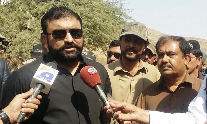 HUB: Balochistan Home Minister Sarfaraz Bugti talking to reporters after his visit to the Shah Noorani shrine on Monday.&mdash;INP