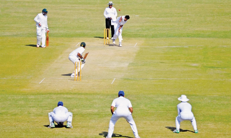 HYDERABAD: UBL paceman Sadaif Mehdi bowls to an unidentified KRL batsman during their Quaid-i-Azam Trophy Super Eight round match at the Niaz Stadium on Saturday.&mdash;INP