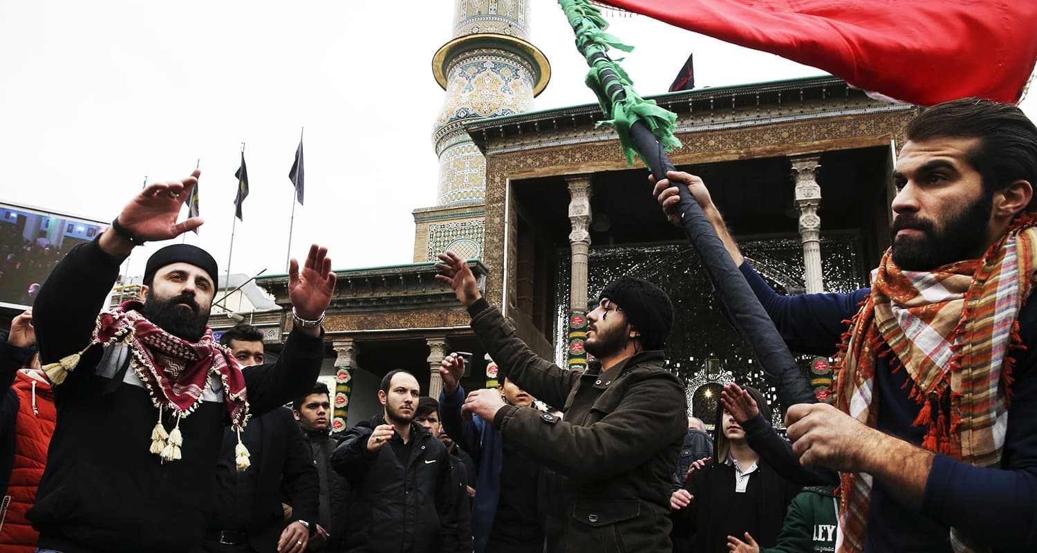 Men gather to take a procession out to commemorate Chehlum. — AP