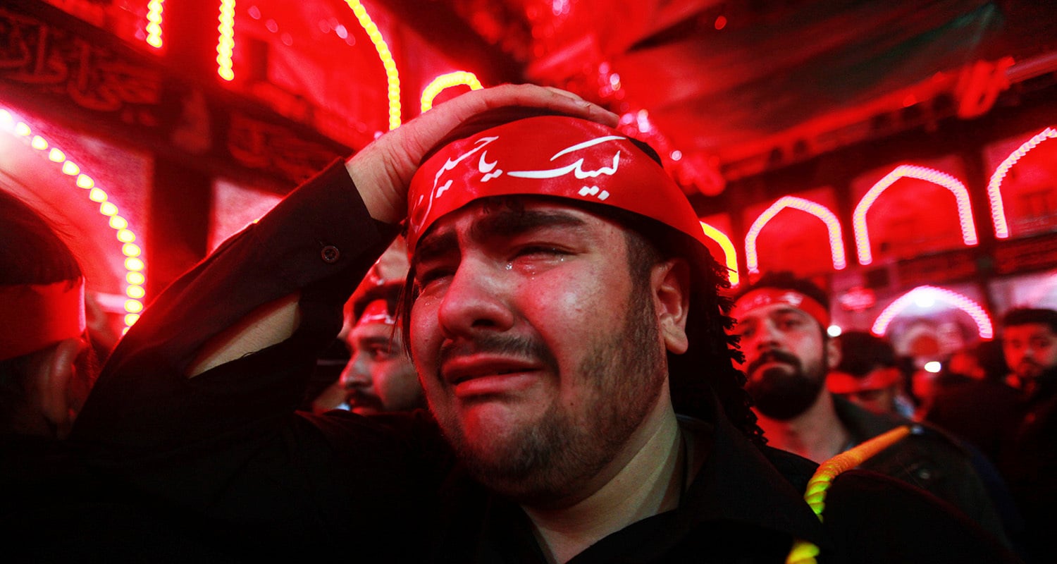 A man cries during the Chehlum rituals at Karbala. — Reuters