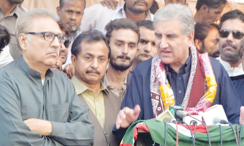 PTI leader Shah Mehmood Qureshi speaks to the media in Hyderabad on Friday.—Dawn PTI leader Shah Mehmood Qureshi speaks to the media in Hyderabad on Friday.—Dawn