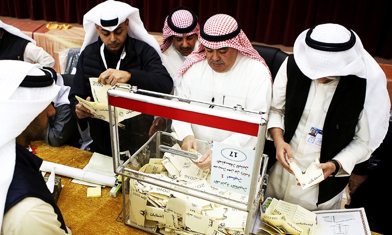 A Kuwaiti judge (C) and his aides count the ballots at a polling station at the end of the vote in the Sabah al-Salem district on the outskirts of Kuwait city on November 26, 2016.—AFP A Kuwaiti judge (C) and his aides count the ballots at a polling station at the end of the vote in the Sabah al-Salem district on the outskirts of Kuwait city on November 26, 2016.—AFP