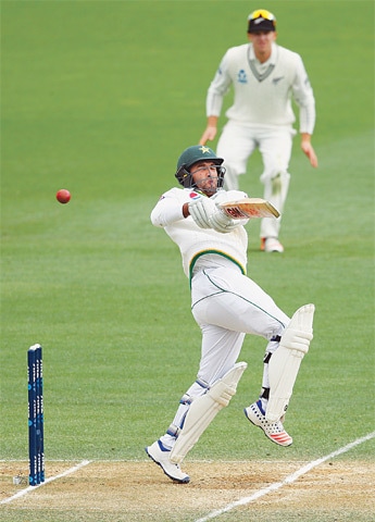 HAMILTON: Pakistan opener Sami Aslam pulls during his innings of 91 on day five of the second Test against New Zealand at Seddon Park on Tuesday.—AFP
