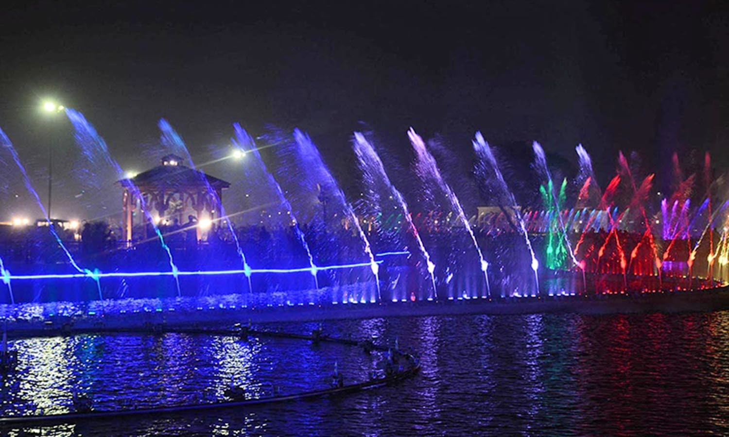 A beautiful view of moving fountains with colour lights at Greater Iqbal Park.  —Online