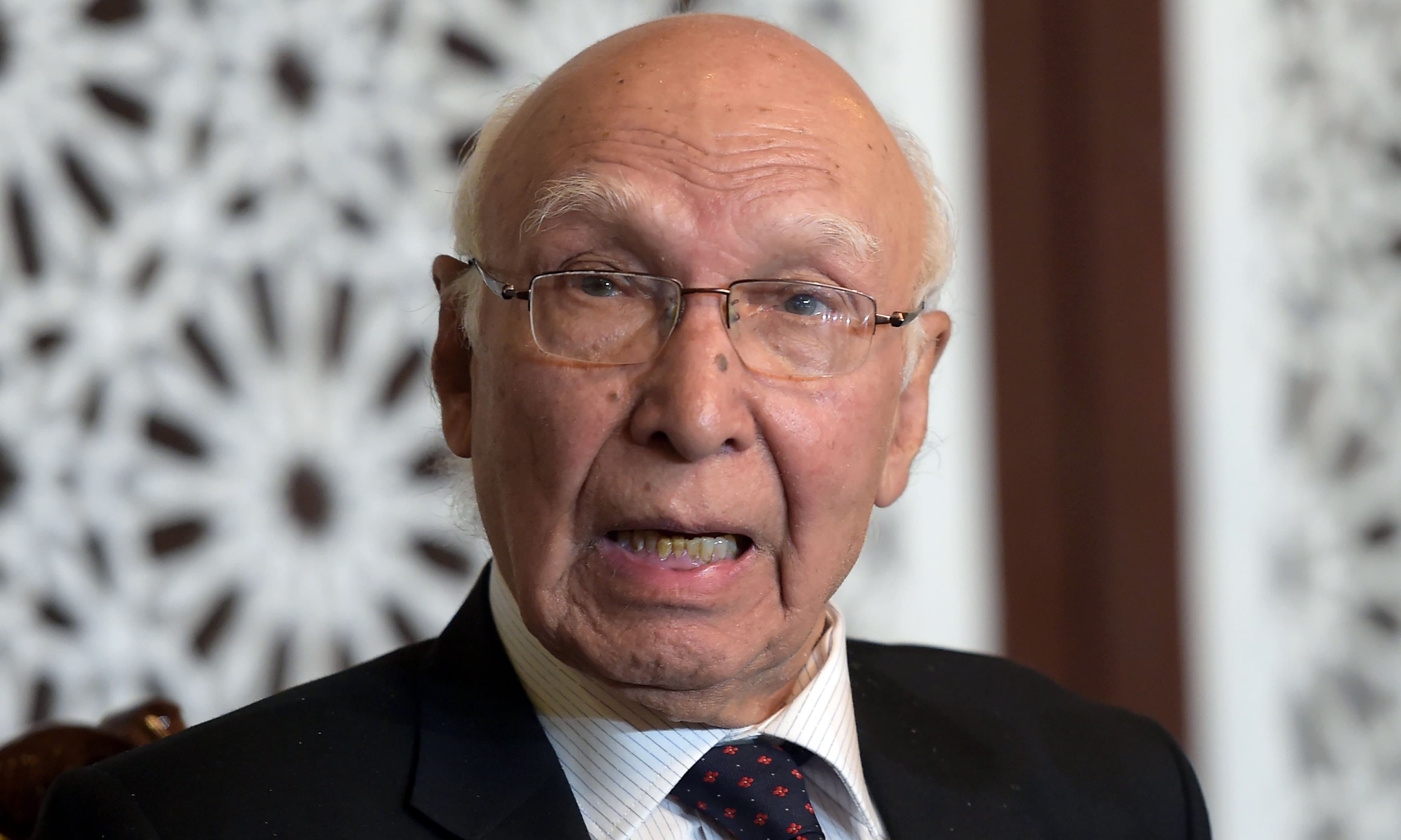 Sartaj Aziz speaks during a news conference at the Foreign Ministry in Islamabad. —AFP