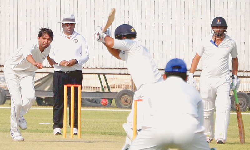 HYDERABAD: Wapda seamer Mohammad Asif bowls during the Quaid-i-Azam Trophy Super Eight match against SSGC at the Niaz Stadium on Sunday.&mdash;INP