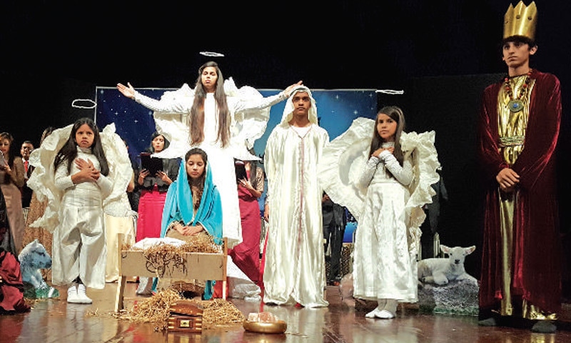 Children sing Christmas carols at the PNCA auditorium in Islamabad.