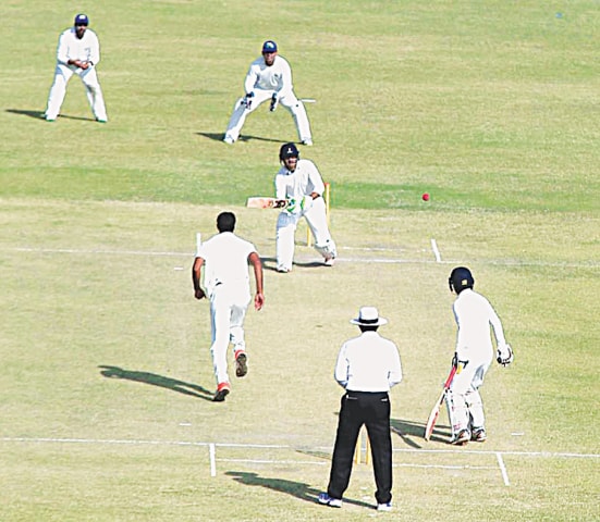 HYDERABAD: A view of the Quaid-i-Azam Trophy Super Eight match between Wapda and SSGC at the Niaz Stadium here on Monday.—APP