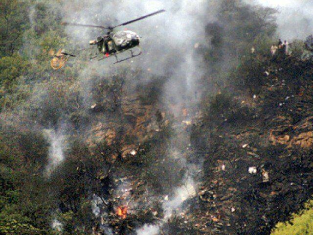 Helicopters circle overhead the crash site. ─ Local police