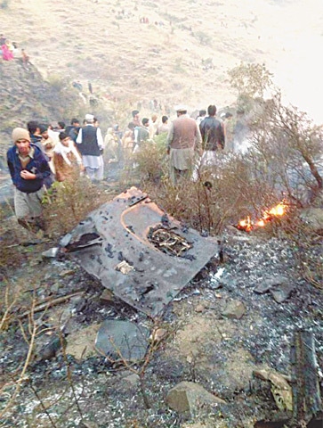 Wreckage of PIA flight PK-661 lies near Havelian after it crashed while on way to Islamabad from Chitral on Wednesday evening.—INP