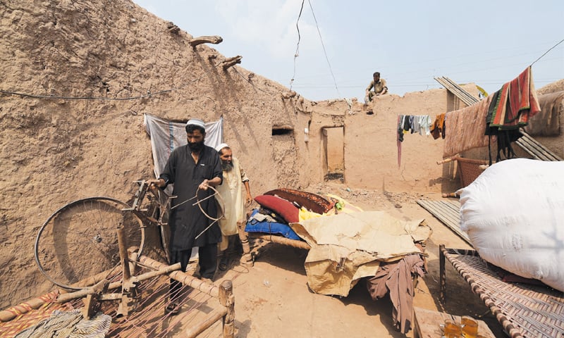 Afghan refugees who had built houses in Chow Gujjar, Peshawar prepare to leave for Afghanistan