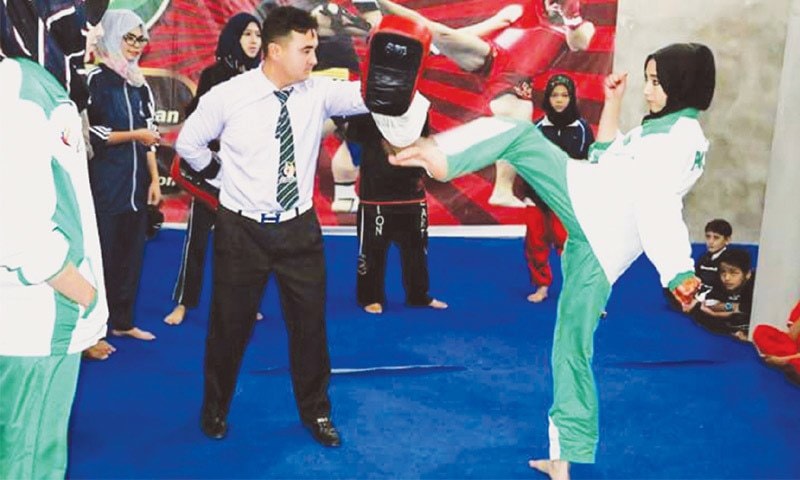 A Hazara girl practising Wushu Karate at Lions Hearts Academy. A Hazara girl practising Wushu Karate at Lions Hearts Academy.