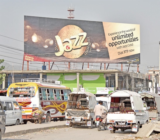 Large billboards installed on buildings in Bhara Kahu shows that the local government setup is paying no heed to framing policies. &mdash; Photos by Khurram Amin