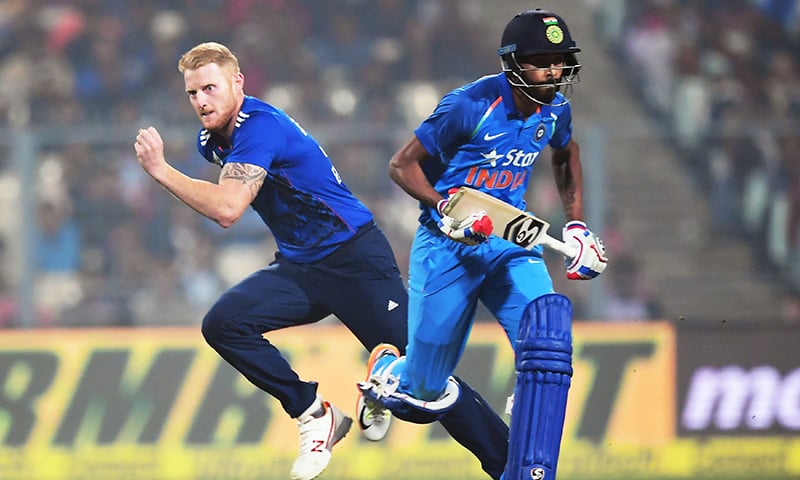 India's Hardik Pandya runs to complete a run as England's Ben Stokes fields the ball. -AFP