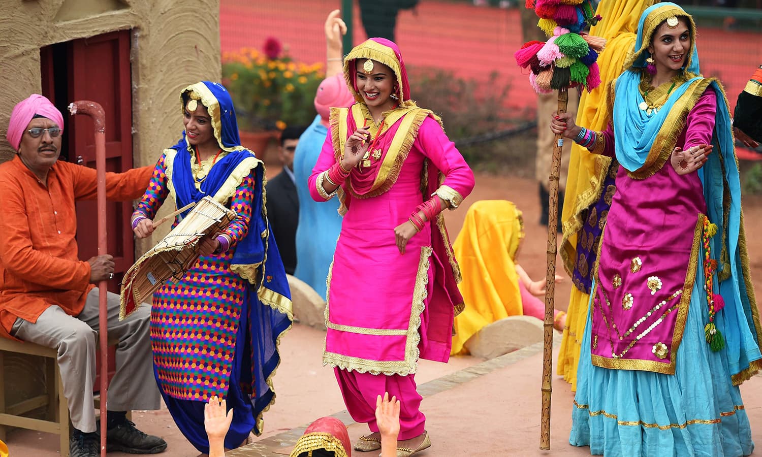 Indian artists from Punjab perform during the 68th Republic Day parade in New Delhi. — AFP