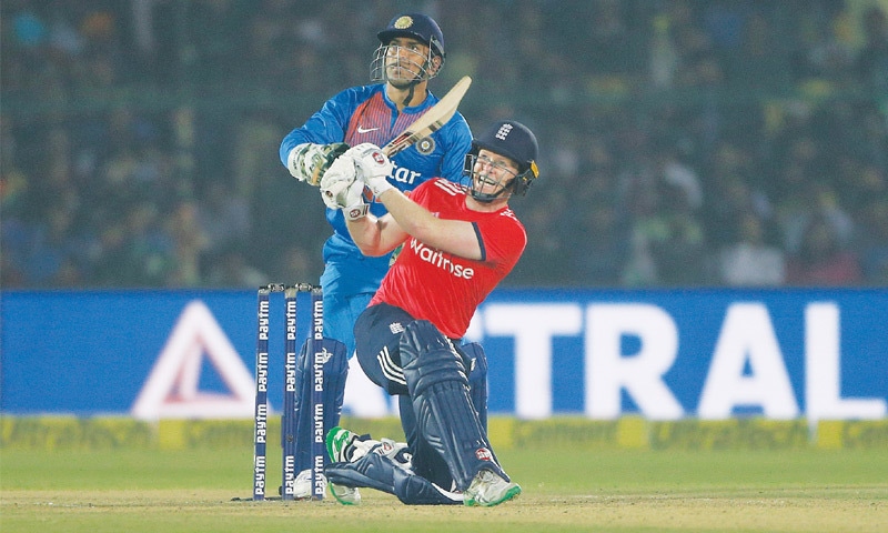 KANPUR: England captain Eoin Morgan hits a six during the first Twenty20 against India on Thursday.&mdash;AP