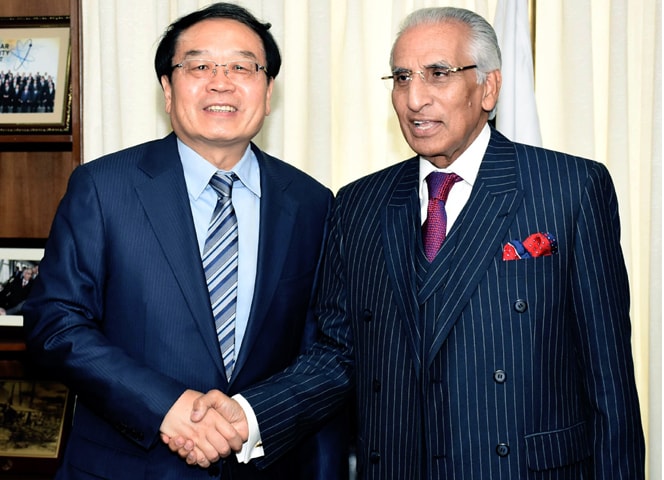 Special Assistant to the PM on Foreign Affairs Syed Tariq Fatemi shakes hands with Chinese State Commissioner for Counter Terrorism and Security Cheng Guoping prior to their meeting on Monday.