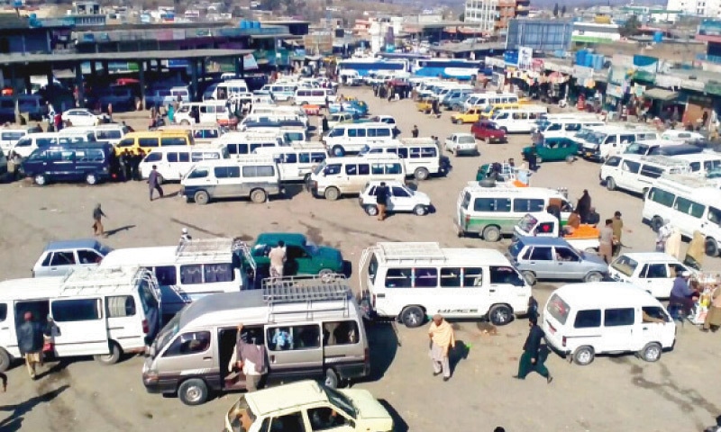 Passenger vehicles have been parked at a terminal after transporters went on strike in Mansehra on Thursday. &mdash; Dawn
