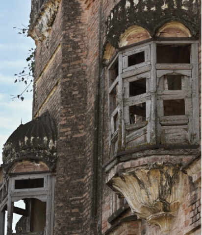 Enclosed balconies, known as Jharokas, surround the haveli
