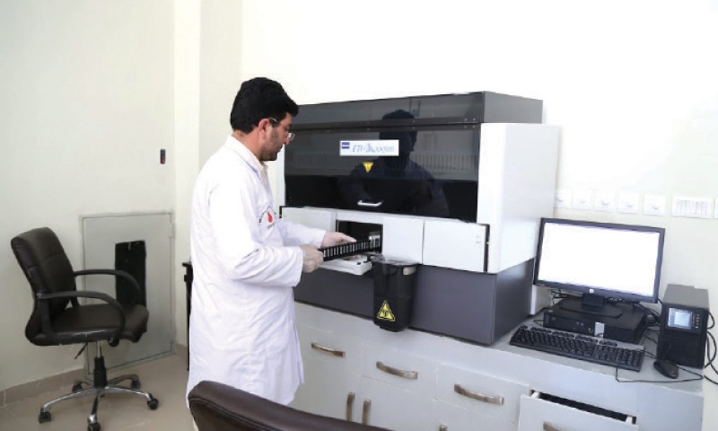 Blood samples being screened at a laboratory of Safe Blood Transfusion Programme in Islamabad. Blood samples being screened at a laboratory of Safe Blood Transfusion Programme in Islamabad.