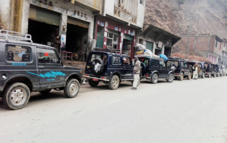 Jeep drivers wait for passengers in Bely Baba area of Shangla. &mdash; Dawn