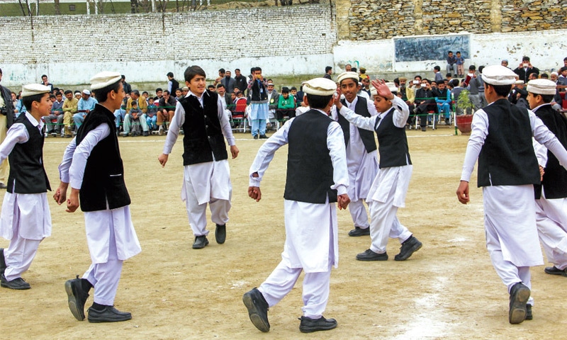 Students perform a traditional dance at the prize distribution ceremony in Mingora on Tuesday. &mdash; Dawn