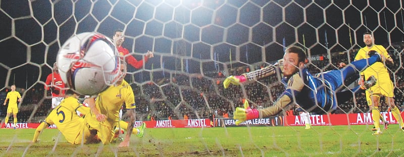 ROSTOV-ON-DON: Manchester United&rsquo;s Henrikh Mkhitaryan (third R) scores during the Europa League last-16 first leg against FC Rostov at the Olimp-2 Stadium.&mdash;Reuters