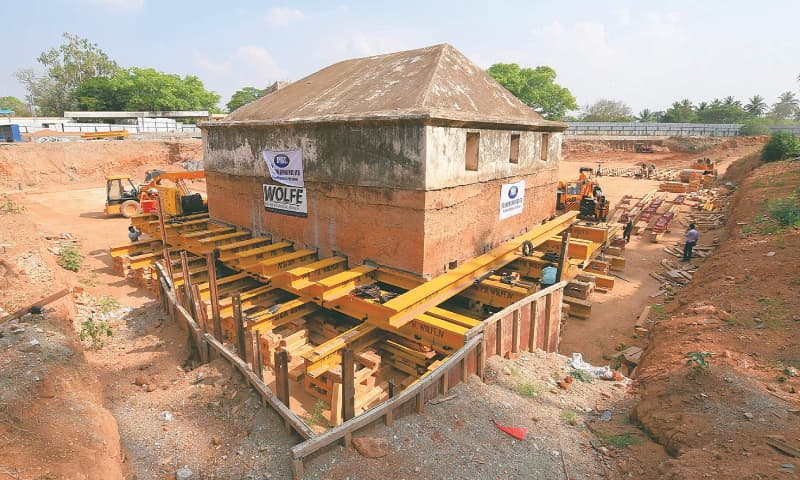 The historic armoury is moved by workers.&mdash; AFP