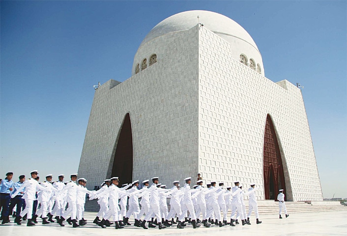 NAVAL cadets parade in front of the Quaid’s mausoleum on Thursday.—PPI