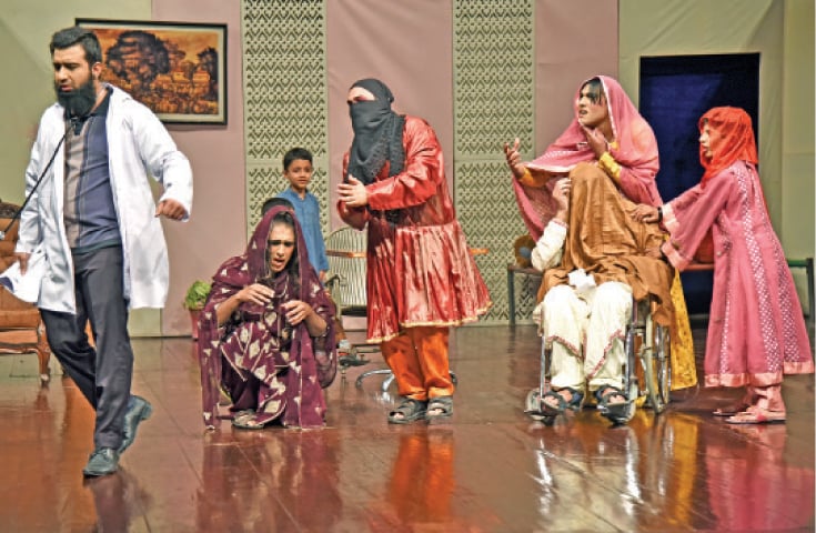Students of ICB, G-6/3, stage a play Randa-i-Darga while those of IST &mdash; Photos by Khurram Amin